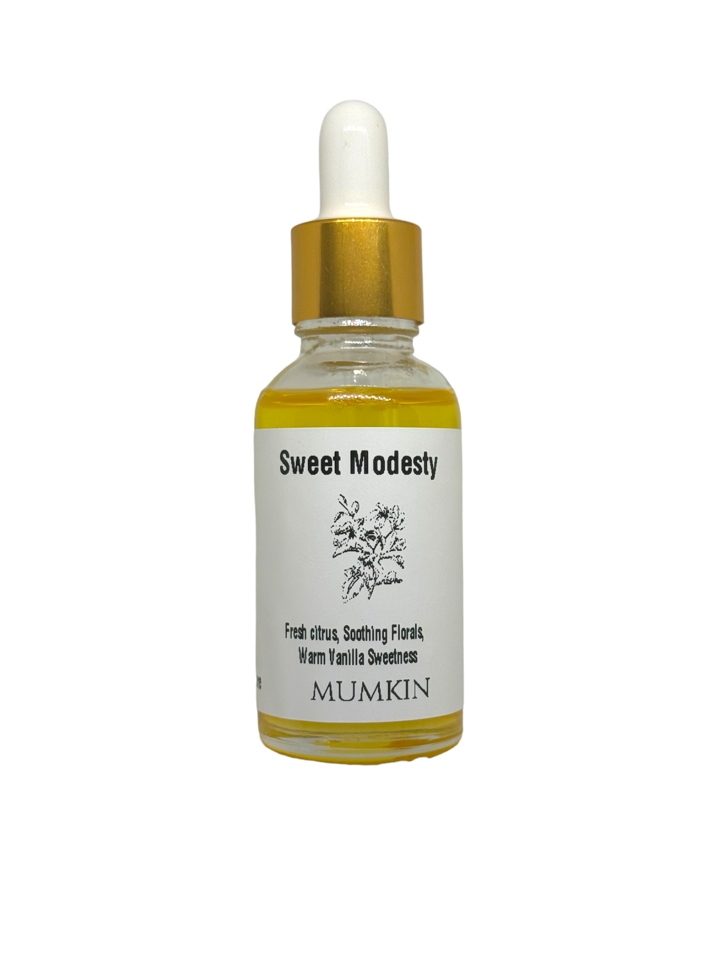A clear glass dropper bottle of 'Sweet Modesty' by MUMKIN, filled with golden-yellow oil. The bottle has a gold and white dropper cap and a minimalist white label featuring black text and a botanical illustration. The label describes the scent profile as fresh citrus, soothing florals, and warm vanilla sweetness. The product is isolated on a white background.